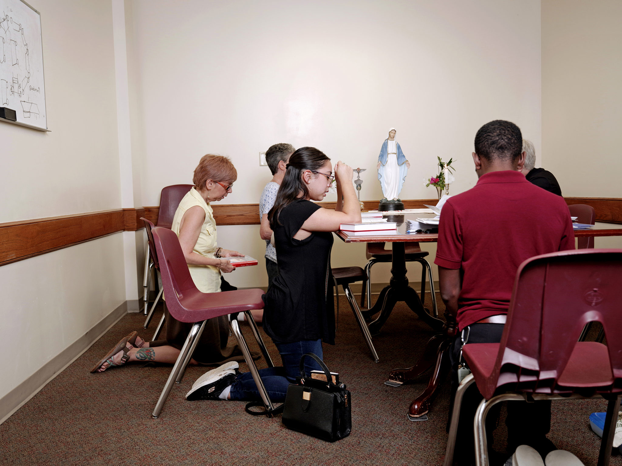 The Legion of Mary group prays a rosary together at the Cathedral of Christ the King. Photographed at center is Monica Juarez. Photo by Johnathon Kelso