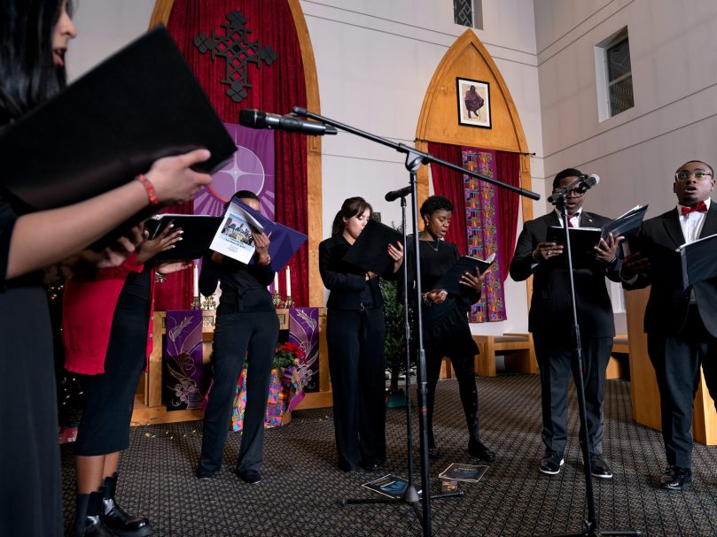 The Thea Bowman Scholars perform a song during the Lessons & Carols event hosted at the Lyke House. Photographer, Johnathon Kelso