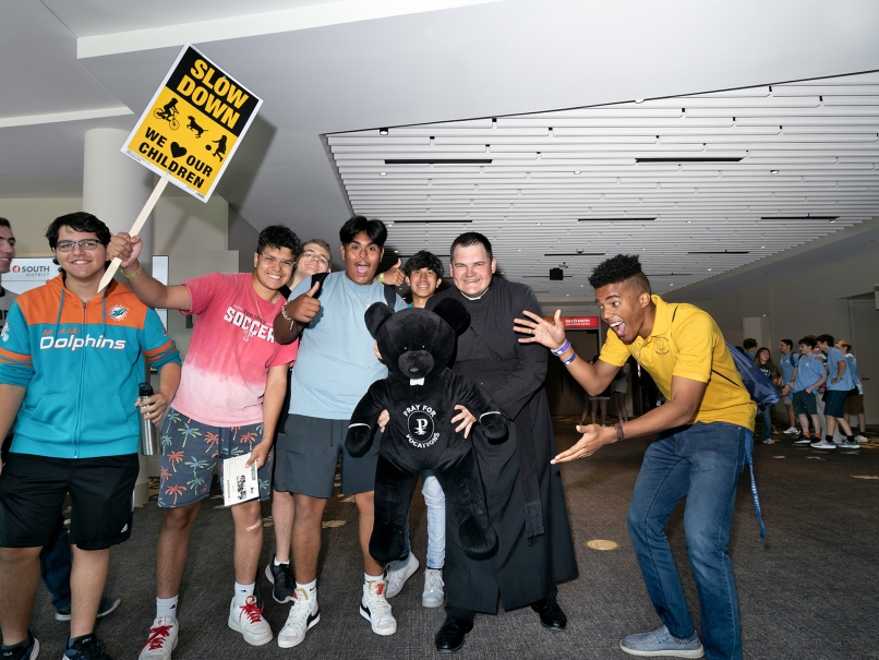 Seminarian Sean Lee, center, and friends from the 2023 Steubenville Life Teen Conference in Duluth gather for a photograph. Photo by Johnathon Kelso