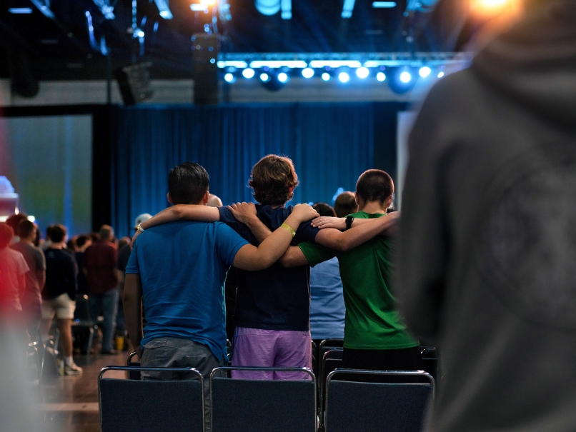 Young men pray together during one of the sessions held during the 2023 Steubenville Life Teen Conference in Atlanta. Photo by Johnathon Kelso