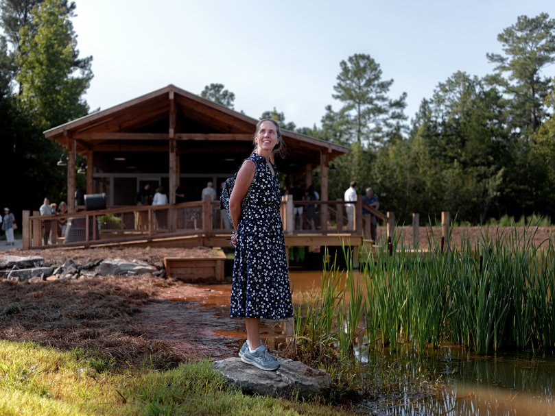 Monica Hagan enjoys the grounds at Heritage Preserve during the dedication of the Seven Sorrows Walk in September. Photo by Johnathon Kelso