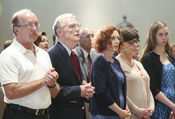 (L-r) Tim Higgins, a friend of the Gallagher family, John Gallagher, Father Timothy Gallagher’s father from Madison, Teresa Miller, Father Gallagher’s sister from Alexandria, Va., Cyndi Simmons, his other sister from Lawrenceville, and his niece and Teresa’s daughter, Rebecca, were among some of the family and friends on hand for the June 24 Mass of blessing and dedication for the new St. Bernadette Parish Center, Cedartown. Photo By Michael Alexander