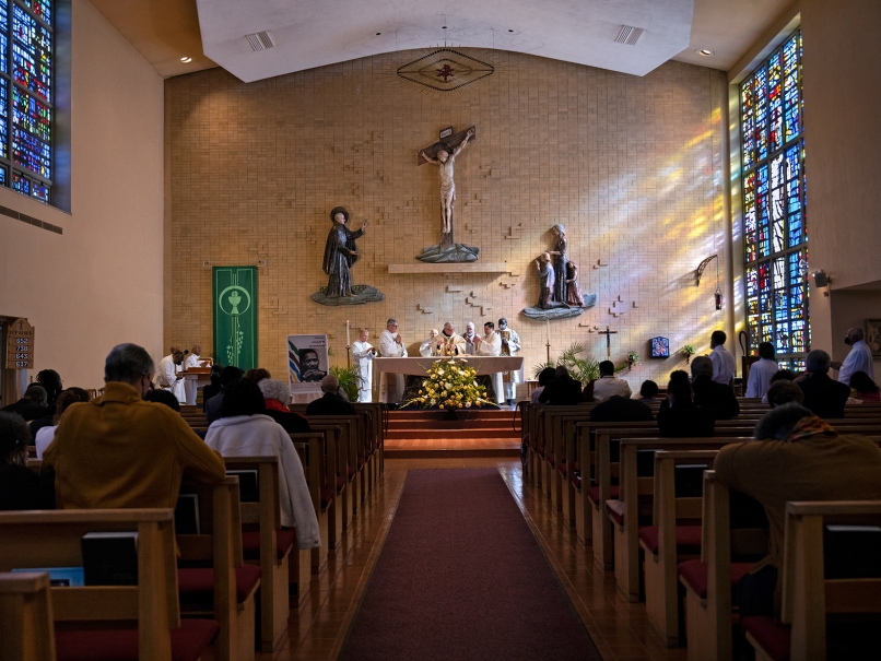 Archbishop Gregory J. Hartmayer, OFM Conv., center, and clergy, photographed at the altar at Saint Paul of the Cross Church, during the Eucharistic Liturgy. Photo by Johnathon Kelso