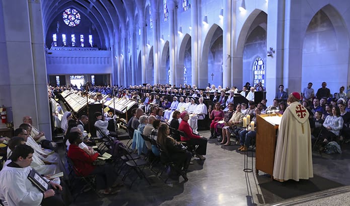 Archbishop Wilton D. Gregory, right, addresses a congregation of over 600 consecrated religious and laypersons at the Monastery of the Holy Spirit, Conyers, on the Feast of the Presentation of the Lord, Feb. 2. Photo by Michael Alexander