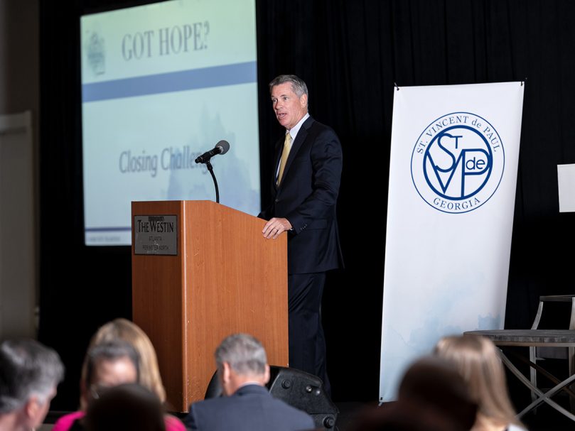 Patrick McNulty, CEO of St. Vincent de Paul Georgia, gives closing remarks during the Morning of Hope event held on Aug. 25. Photo by Johnathon Kelso