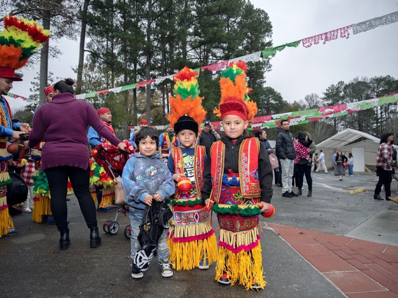 Children prepare for a dance during a two-day celebration held at St. Oliver Plunkett Church in honor of Our Lady of Guadalupe. Photo by Johnathon Kelso