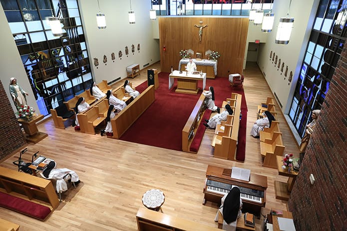 Father Paul Burke, the chaplain at Our Lady of Perpetual Help Home, is the main celebrant for the daily 6:30 a.m. Mass in the chapel. Photo By Michael Alexander