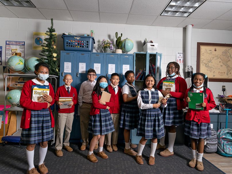 Students prepare for class at Our Lady of Victory school in Tyrone. Photo by Johnathon Kelso