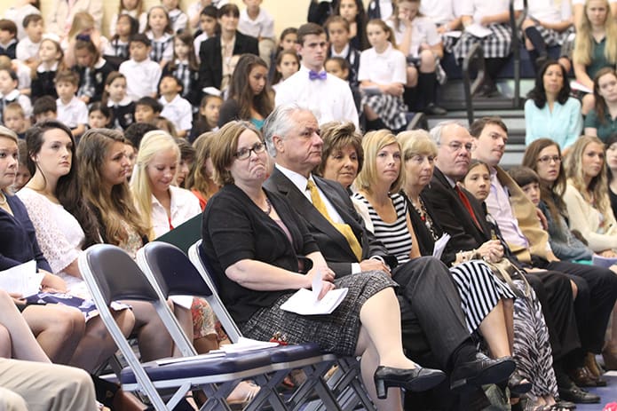 Several of Pinecrest Academy’s founding families were on hand for the special anniversary liturgy including (front row, l-r) Laura Kelley, Doug and Brenda Tollett, Stacey Persichetti and Arlene and John Gannon. Persichetti is the daughter of the Gannons. Photo By Michael Alexander