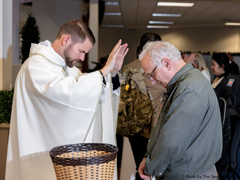 Father David DesPres blesses the faithful following his  ordination to the priesthood at Holy Vietnamese Martyrs Church. Photo by Johnathon KelsoFather David DesPres blesses the faithful following the Mass of ordination to the priesthood at Holy Vietnamese Martyrs Church. Photo by Johnathon Kelso