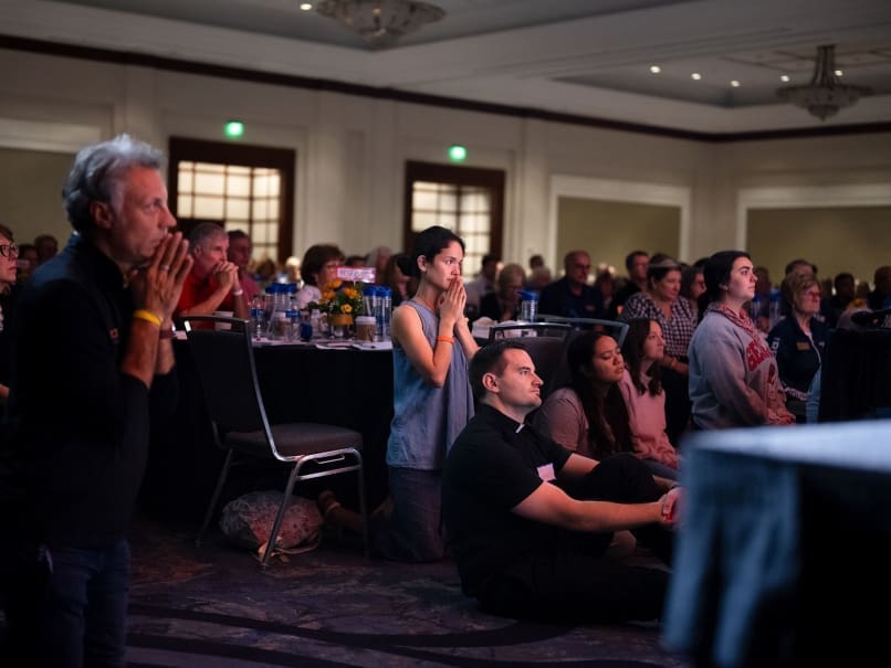 Father Brian McNavish, center, and other participants of Rescue Atlanta pray together at the Sept. 9 day retreat, organized by the Office of Evangelization and Discipleship of the archdiocese. Photo by Johnathon Kelso