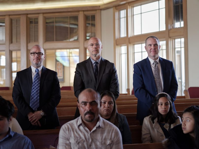 Participants in the March 5 Rite of Election at St. Catherine of Siena Church stand as their names are read aloud. There are 489 catechumens and 914 candidates becoming Catholics in Atlanta.