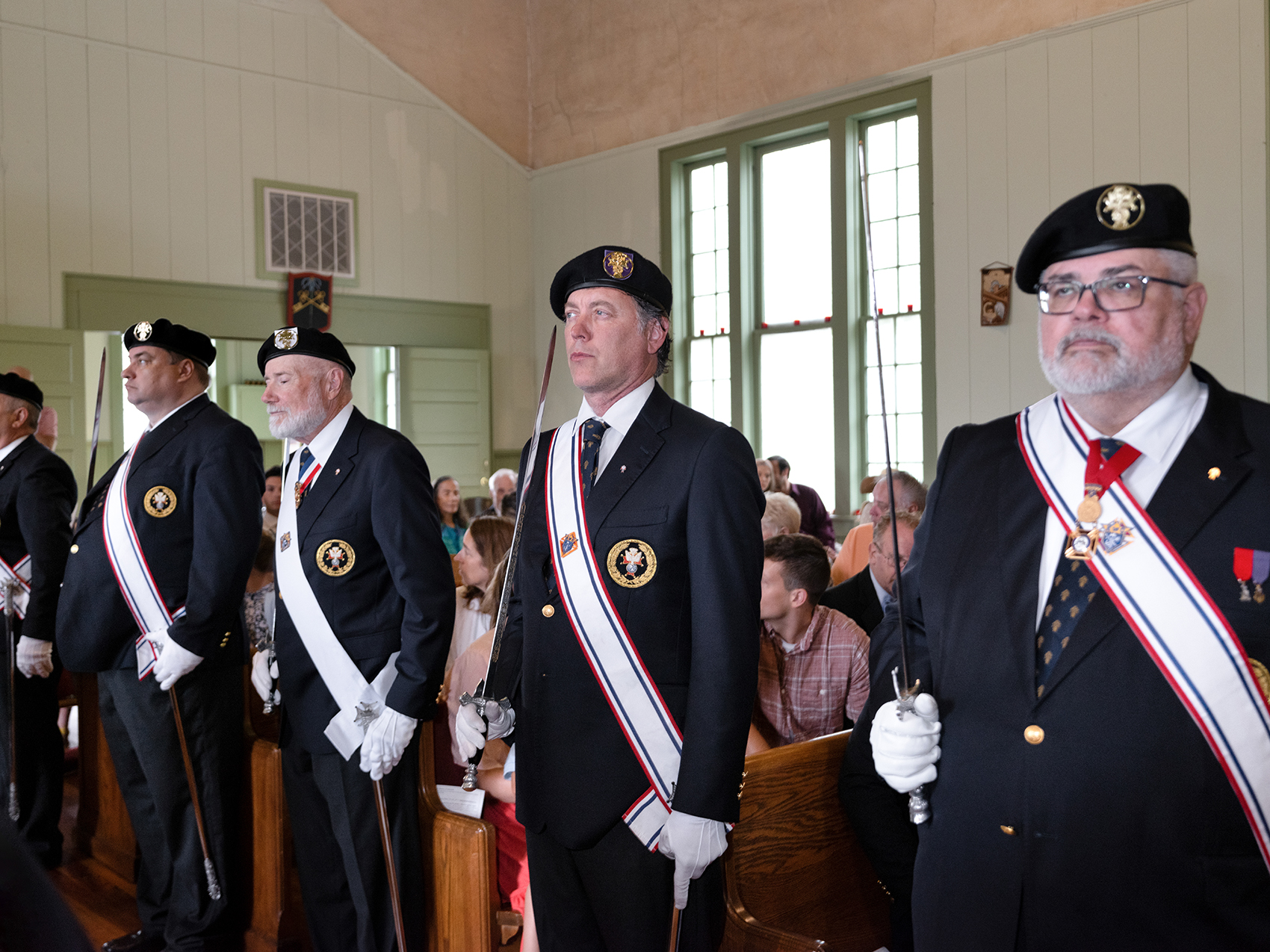 Knights of Columbus line the center aisle toward the altar during the procession at St. Aelred Church in Bishop during the Feast of Corpus Christi. Photo by Johnathon Kelso