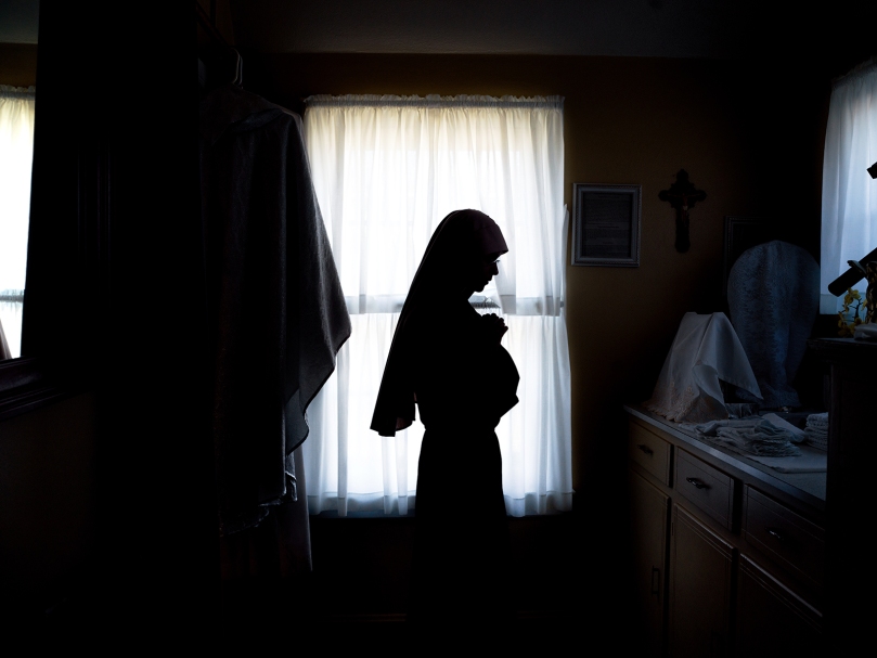 Sister Bernarda prays before Mass at the convent at Fraternitas St. Katherine Drexel, the original church building of St. Bernadette. Photo by Johnathon Kelso