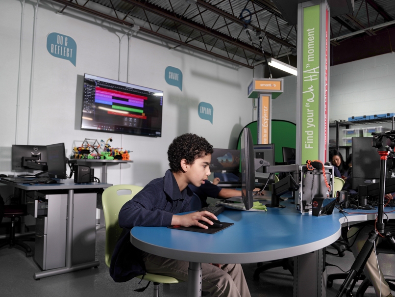 Fifth-grade student Victor de Moya works inside the Smartlab at Saint Peter Claver Regional School. Photo by Johnathon Kelso