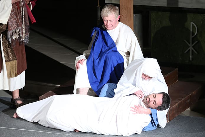 John, the disciple of Jesus sits by after Jesus is wrapped in clean linen, and Mary, the Mother of Jesus, has a final moment with Jesus before heâs laid in the tomb.