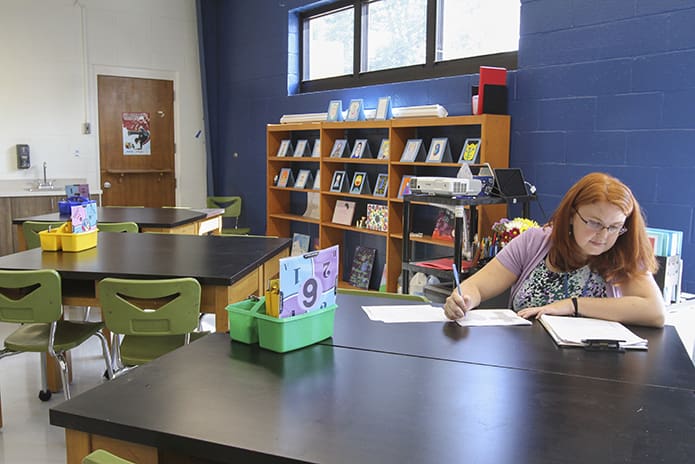 Second year art teacher Anna Fallon gets ready for her 11:15 a.m. art class in the new fine arts wing. In addition to the art room there is a choral and music room. Photo By Michael Alexander