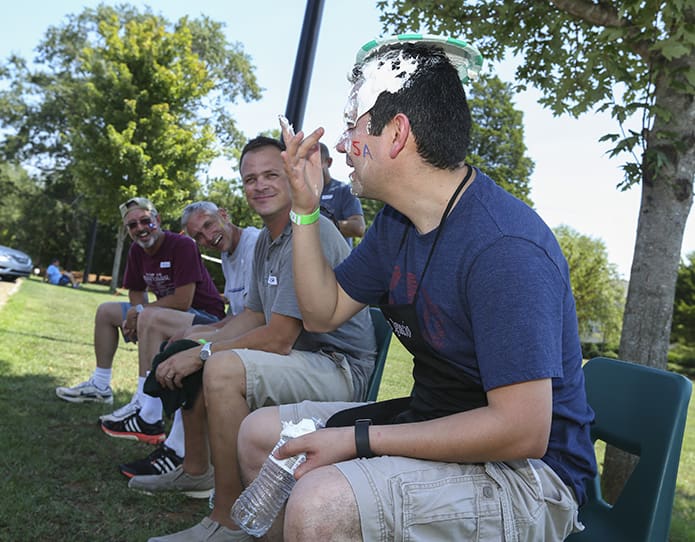 Parishioners made donations of $10 so they could throw a cream pie at (foreground to background) the pastor, Father Ignacio Morales, Zach Schlag, Deacon Frank Przybylek or Deacon Johnny Rentas. Photo By Michael Alexander