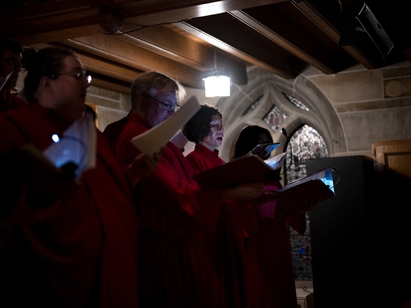 The choir sings the liturgy during a Tenebrae service at Cathedral of Christ of the King. Tenebrae is a solemn prayer service of song and Scripture, marked by the gradual extinguishing of lights until the service ends in darkness and silence. Photo by Johnathon Kelso