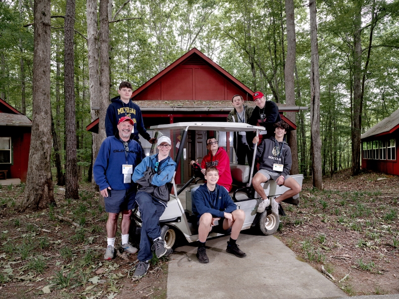 Campers and camp councelors pose for a photograph outside one of the cabins during Toni's Camp held in Rutledge. Photo by Johnathon Kelso