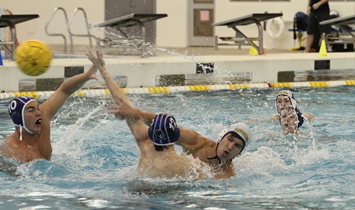 St. Pius sophomore Jordan Chatfield, right center scores the teamâs fourth goal at the beginning of the second quarter. He also scored the teamâs final goal before the end of regulation that ended in a 13-13 tie. Photo By Michael Alexander