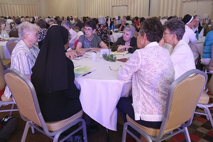 Sisters on hand for the Leadership Conference of Women Religious (LCWR) share ideas regarding what a conference for a post contemporary generation of women religious would look like. Photo By Michael Alexander