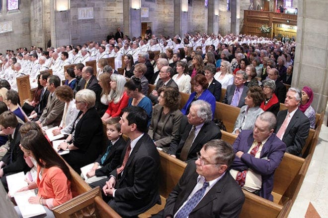 More than 650 people fill the Cathedral of Christ the King for the April 2 episcopal ordination of David Talley. Overflow seating was provided in Kenny Hall and across the street at Second-Ponce de Leon Baptist Church.