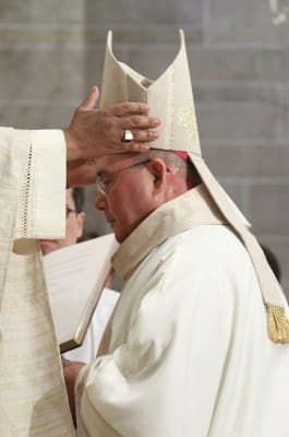 Bishop David P. Talley receives the miter, one of the signs of this office as bishop.