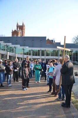 Left: The 33rd annual Good Friday Pilgrimage was held March 29, with a large group of people of all faiths gathering to remember in a public way the crucifixion of Jesus Christ within the urban setting of Atlanta.