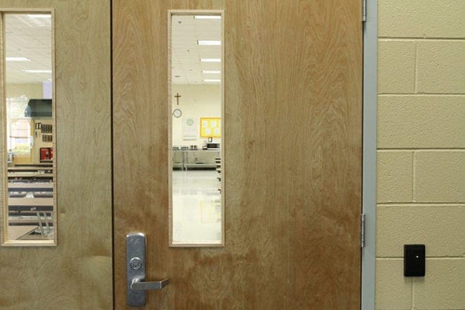 Once an open area with free access to visitors, today the only way to gain admittance to the school cafeteria at Blessed Trinity High School, Roswell, is by way of a key card. (Photo By Michael Alexander)