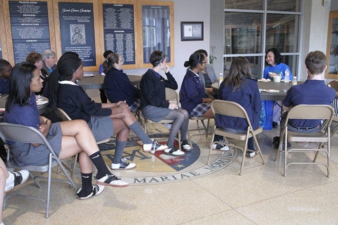 Following a presentation to the entire student body, Kim Phuc Phan Thi speaks with a smaller group of students from campus organizations like the Emmaus board, the Mosaic diversity group and the Eucharistic minister board. Phuc further informed the students that her life was changed forever in 1972, but she did not allow war to kill her life, hope or future. Photo By Michael Alexander