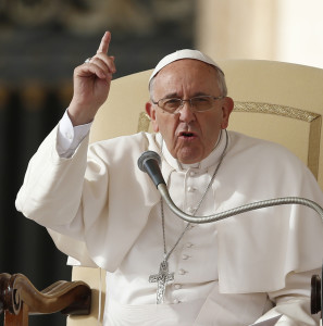 Pope Francis makes a point as he leads his general audience in St. Peter's Square at the Vatican Nov. 20. In his apostolic exhortation "Evangelii Gaudium" ("The Joy of the Gospel"), the pope addressed shortcomings of the church itself that he believes impede the bringing of "all those whom Jesus summons to friendship with him."