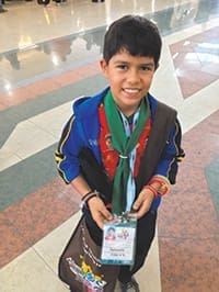 Pictured at the congress, a young boy’s kerchiefs show he is already an active missionary. Photo courtesy of Msgr. Dan Stack