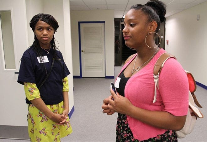 ‘Adah Ricks, left, and Autumn Smith will be attending the newest Cristo Rey Jesuit High School this August in Midtown Atlanta. Photo By Michael Alexander 