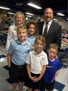 Sophia Academy, Atlanta, hosted a Dads Breakfast Sept. 24, where fathers shared some special time with their youngsters and heard a talk by school parent Trent Miles, GSU football coach, pictured above, back row, right. Pictured with Miles are Marie S. Corrigan, founding director of the school, back row, left, and Miles’ children, left to right, Anna, Kaylee, Charlie and Noah Miles.