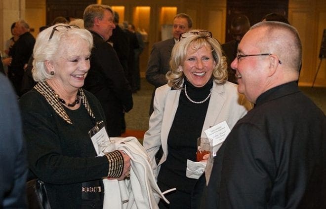 Among the more than 300 educators, staff and guests who gathered to celebrate Catholic education at the annual banquet concluding National Catholic Schools Week Jan. 31, were (l-r): Susan Dorner and Cathy Lancaster, assistant principals at Blessed Trinity High School, Roswell, and Bishop David P. Talley. Photo By Thomas Spink