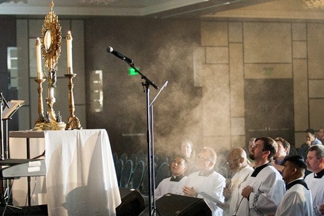 As part of “Revive,” young adults participated in adoration of the Blessed Sacrament. Adoration has been an essential part of the worship during the 20 years of the Eucharistic Congress in the Archdiocese of Atlanta. Photo By Thomas Spink