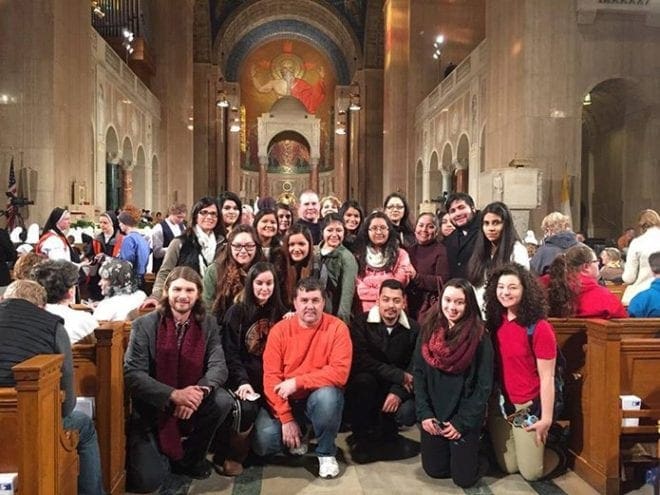 Parishioners from St. Michael Church, Gainesville, attend the opening Mass for Life at the Basilica of the National Shrine of the Immaculate Conception Jan. 21 in Washington, D.C. Tony Maturo, back row, center, heads the parish Respect Life ministry and led the group. Other parishes joined the Gainesville group and their bus trip home was delayed by snow.