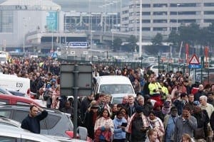 People evacuate Zaventem airport after explosions near Brussels March 22. CNS Photo/Laurent Dubrule, EPA