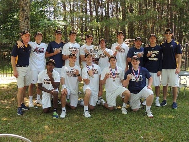 Marist School boys head tennis coach Tommy Marshall, back row, far left, and his team won its third consecutive state championship. The team did not drop a set during the state playoffs.