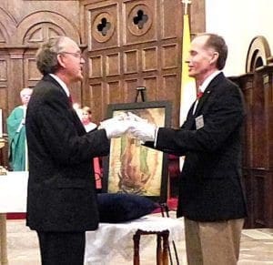 Knights of Columbus Georgia State Deputy, Mark McMullen, right, transfers the Silver Rose to the Florida State Deputy, Don Goolseby, at Holy Spirit Church, Atlanta, June 19. The Knights of Columbus of Georgia participated in the 2016 Silver Rose Run, as part of a devotion to the Blessed Mother as Our Lady of Guadalupe. The rose is a symbol of the culture of life.